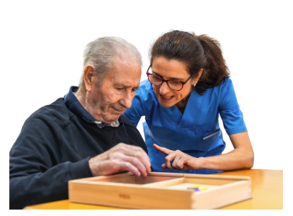 Caregiver helping dementia patient