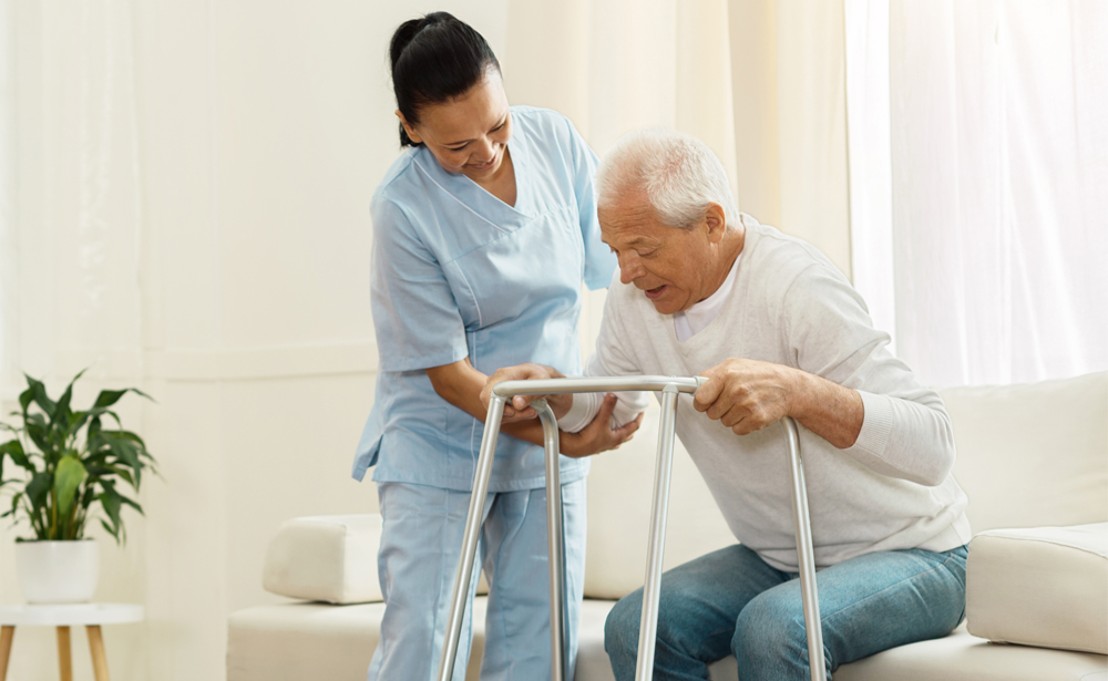 Caregivers taking care of client. Griswold Home Care for Oahu